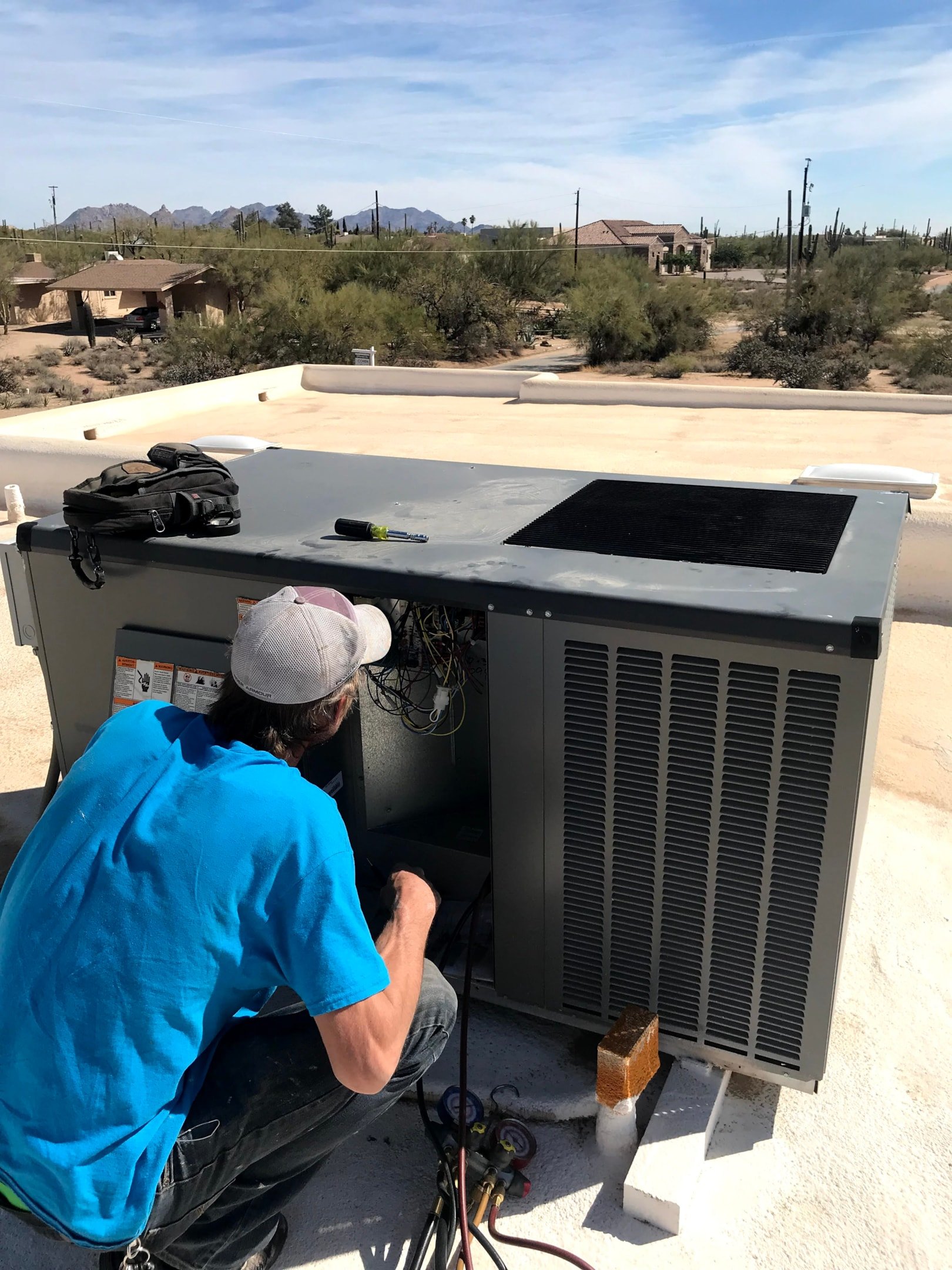 Common signs of AC compressor problems including unusual noises and warm air blowing.