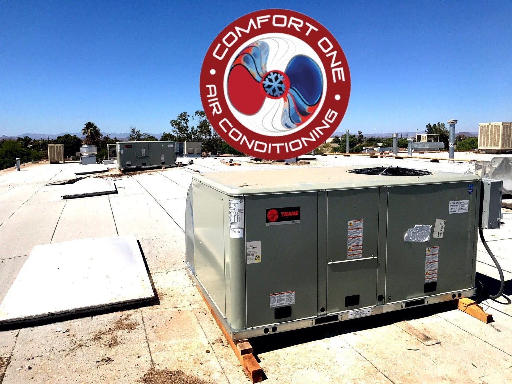 A modern air conditioning unit installed outside a house, showcasing its design and features.