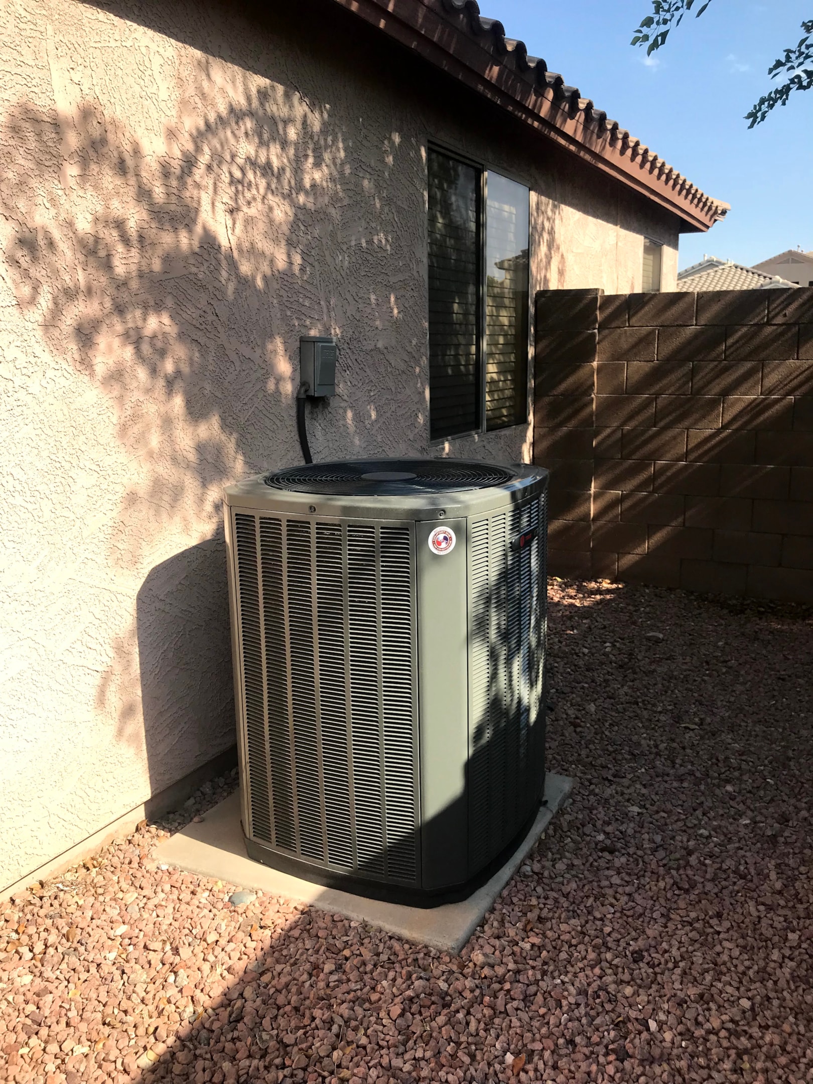 A family discussing financing options for a new air conditioning system.