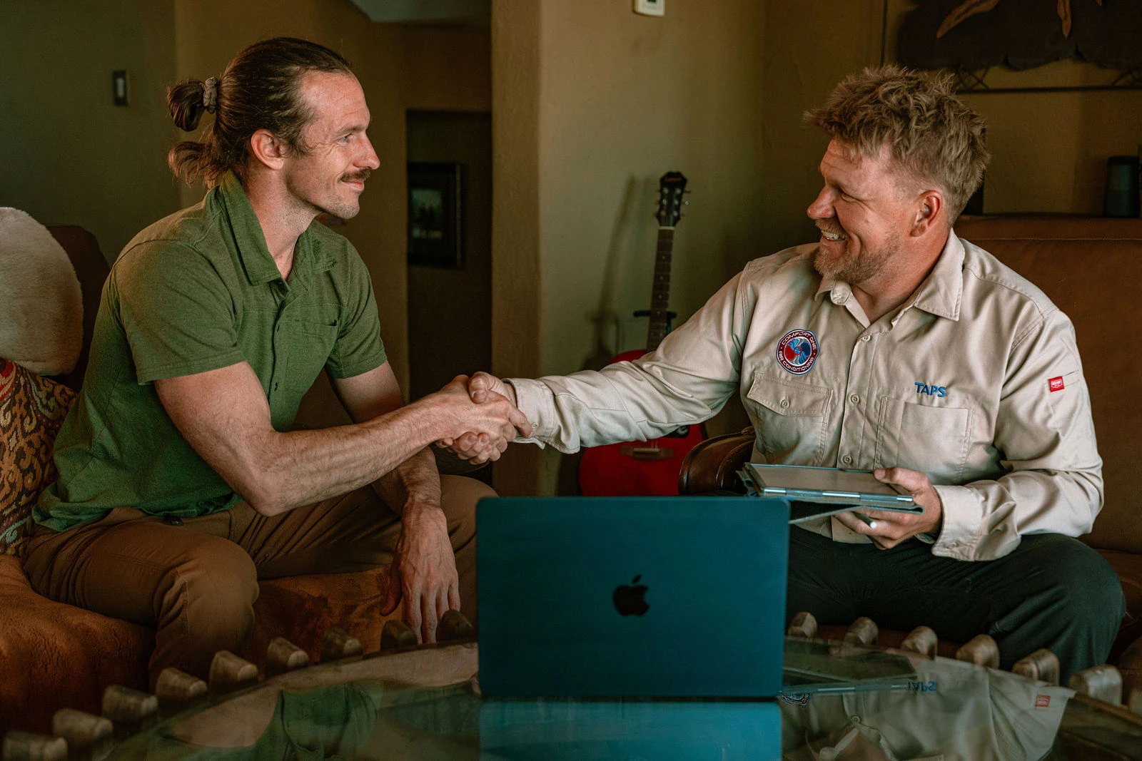 Comfort One Technician helping homeowner